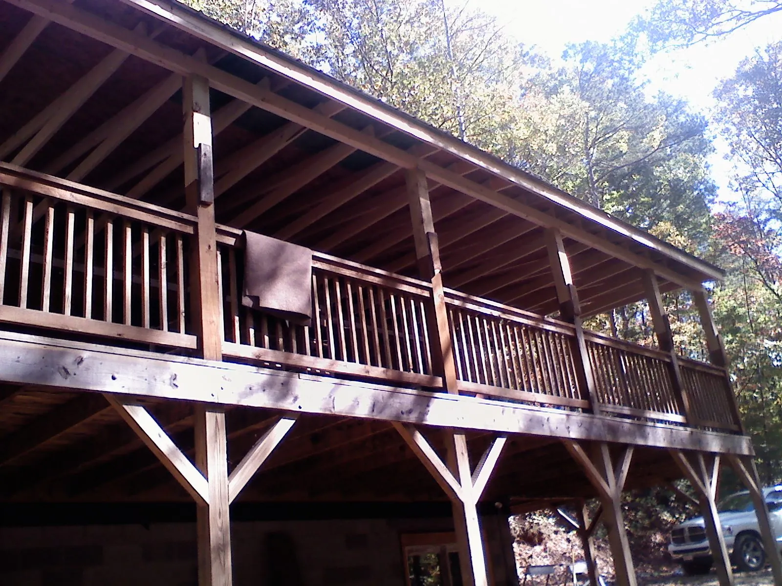 Timber framing under a new elevated porch and deck — Roof Leak Repair in Mount Clemens by Roofing Brothers